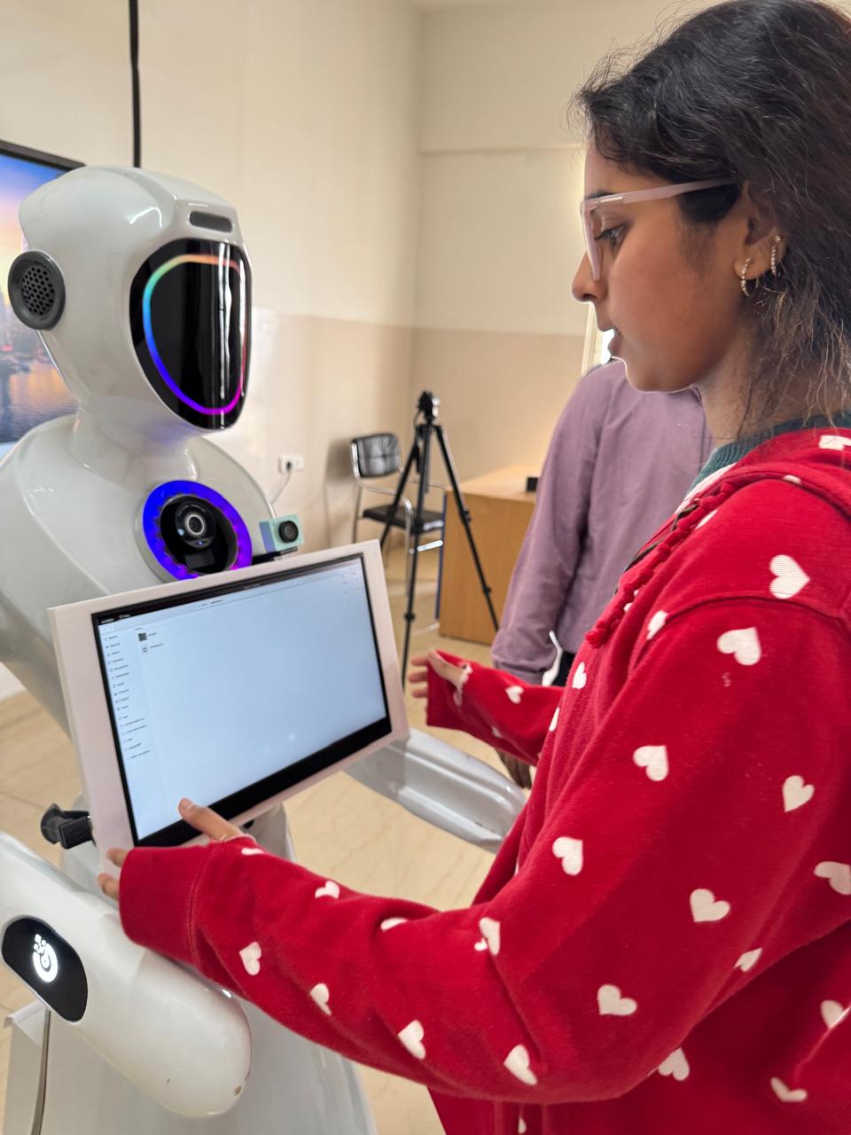 Saina demonstrating EDUBOT in a classroom